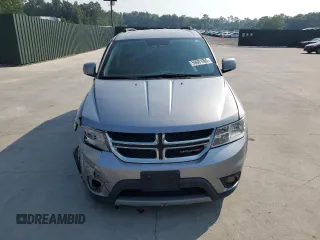 2017 Dodge Journey SXT z VIN 3C4PDCBG4HT532204, wystawiony jako Copart lot #59081935 z przebiegiem 120 923 mil mil oraz Szkoda całkowita • Salvage title. Historia ofert i sprzedaży dostępna na DreamBid. Obrazek 5.