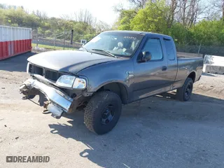 2004 Ford F-150 Heritage XL with VIN 2FTRX18W34CA97890, listed as a IAAI auction lot 42060361 with 177,385 mi miles. Bid and sale history available at carsss.com. Image 2.