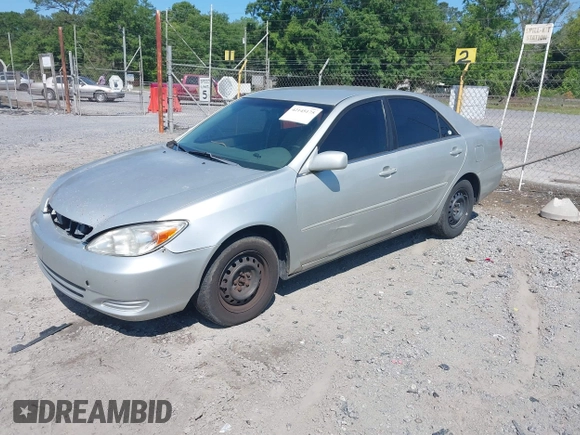2003 Toyota Camry LE with VIN 4T1BE32K03U135482, listed as a IAAI auction lot 42145175 with 172,725 mi miles and . Bid and sale history available at DreamBid. Image 2.
