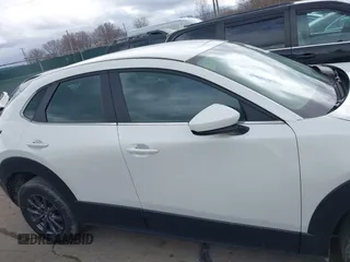 2023 Mazda CX-30 S z VIN 3MVDMBAM6PM572425, wystawiony jako IAAI lot #41833170 z przebiegiem 18 307 mil mil oraz . Historia ofert i sprzedaży dostępna na DreamBid. Obrazek 14.
