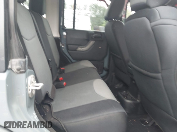 2015 Jeep Wrangler Unlimited Sport with VIN 1C4HJWDG1FL635620, listed as a IAAI auction lot 42396137 with 87,352 mi miles and . Bid and sale history available at DreamBid. Image 8.