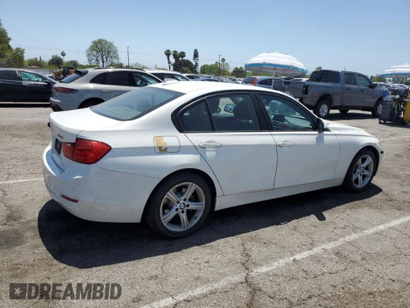 2015 BMW 3 Series 328i with VIN WBA3C1C56FK122177, listed as a Copart auction lot 57333625 with 102,399 mi miles and Salvage title. Bid and sale history available at DreamBid. Image 3.