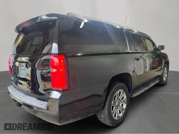 2015 Chevrolet Suburban LT with VIN 1GNSKJKC6FR60382, listed as a Copart auction lot 63533635 with 216,142 mi miles and Clean title. Bid and sale history available at DreamBid. Image 4.
