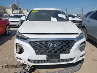 2019 Hyundai Santa Fe SE with VIN 5NMS23AD8KH051223, listed as a IAAI auction lot 42017754 with 146,704 mi miles and . Bid and sale history available at DreamBid. Image 11.