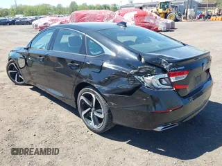 2020 Honda Accord Sport with VIN 1HGCV2F32LA001310, listed as a IAAI auction lot 42144612 with 54,728 mi miles and . Bid and sale history available at DreamBid. Image 3.