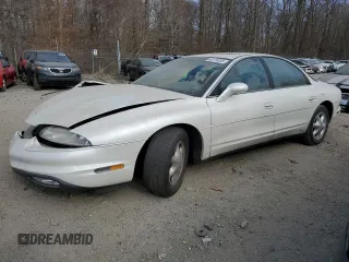 1999 Oldsmobile Aurora with VIN 1G3GR62C4X4112642, listed as a Copart auction lot 48176035 with 100,342 mi miles and Salvage Title. Bid and sale history available at DreamBid. Image 1.