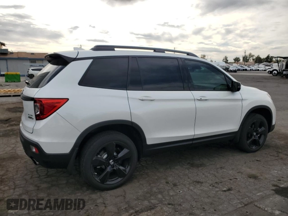 2021 Honda Passport Elite with VIN 5FNYF8H02MB039538, listed as a Copart auction lot 50265265 with 16,737 mi miles and Salvage Title. Bid and sale history available at carsss.com. Image 3.