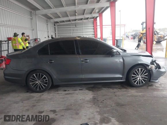 2016 Volkswagen Jetta Sport z VIN 3VWD17AJ3GM416482, wystawiony jako IAAI lot #41653790 z przebiegiem 109 380 mil mil oraz . Historia ofert i sprzedaży dostępna na DreamBid. Obrazek 12.