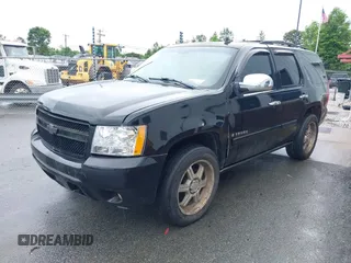 2007 Chevrolet Tahoe LT z VIN 1GNFC13077R275025, wystawiony jako IAAI lot #42255620 z przebiegiem 265 807 mil mil oraz . Historia ofert i sprzedaży dostępna na DreamBid. Obrazek 2.
