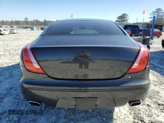 2012 Jaguar XJ with VIN SAJWA1CB1CLV31450, listed as a Copart auction lot 46883875 with 150,268 mi miles and Salvage Title. Bid and sale history available at DreamBid. Image 6.
