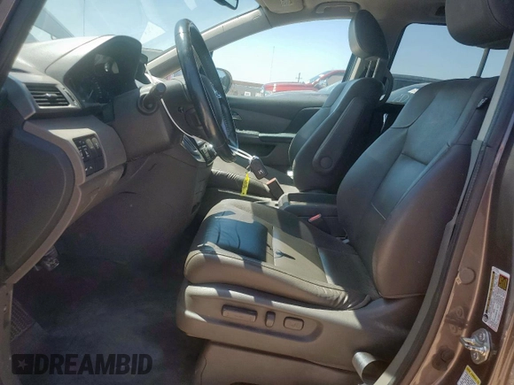 2015 Honda Odyssey Touring Elite z VIN 5FNRL5H97FB002739, wystawiony jako Copart lot #62060695 z przebiegiem 194 604 mil mil oraz Szkoda całkowita • Salvage title. Historia ofert i sprzedaży dostępna na DreamBid. Obrazek 7.