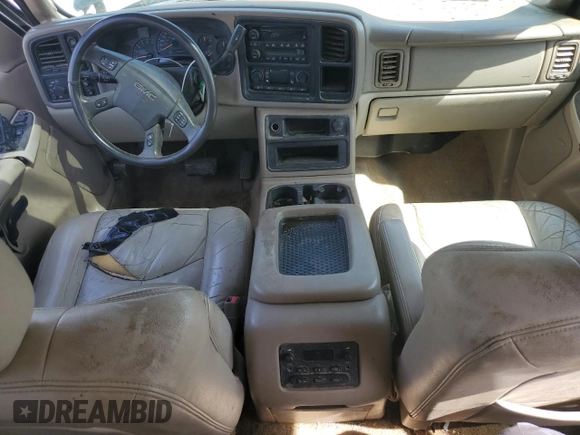 2003 GMC Yukon SLT z VIN 1GKEK13Z53J161625, wystawiony jako Copart lot #54055495 z przebiegiem 346 994 mil mil oraz Nie do naprawy • Non repairable. Historia ofert i sprzedaży dostępna na DreamBid. Obrazek 8.