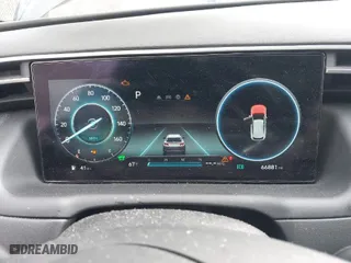 2022 Hyundai Tucson Hybrid SEL Convenience with VIN KM8JFCA15NU015911, listed as a IAAI auction lot 41875212 with 66,881 mi miles. Bid and sale history available at carsss.com. Image 7.