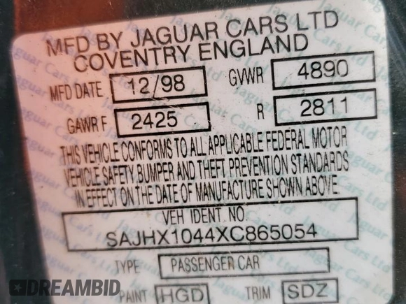 1999 Jaguar XJ with VIN SAJHX1044XC865054, listed as a Copart auction lot 57825325 with 71,145 mi miles and Clean title. Bid and sale history available at DreamBid. Image 12.