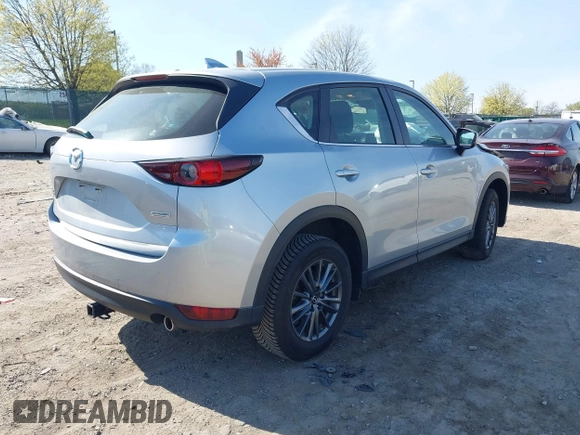 2019 Mazda CX-5 Sport with VIN JM3KFBBM7K0668830, listed as a IAAI auction lot 42069505 with Not Provided miles and . Bid and sale history available at DreamBid. Image 4.