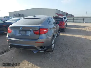 2014 BMW X6 xDrive35i with VIN 5UXFG2C58E0H11141, listed as a IAAI auction lot 42050279 with 191,119 mi miles. Bid and sale history available at carsss.com. Image 4.