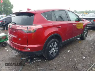 2018 Toyota RAV4 LE with VIN 2T3BFREV4JW850078, listed as a IAAI auction lot 42360903 with 81,591 mi miles and . Bid and sale history available at DreamBid. Image 4.