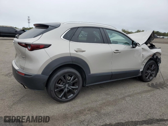 2022 Mazda CX-30 2.5 Turbo with VIN 3MVDMBAY1NM434761, listed as a Copart auction lot 72731244 with 30,331 mi miles and Salvage Title. Bid and sale history available at DreamBid. Image 3.
