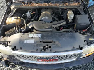 2003 GMC Sierra Denali z VIN 2GTFK69U031261036, wystawiony jako Copart lot #75353324 z przebiegiem 192 762 mil mil oraz Szkody całkowita. Historia ofert i sprzedaży dostępna na DreamBid. Obrazek 12.