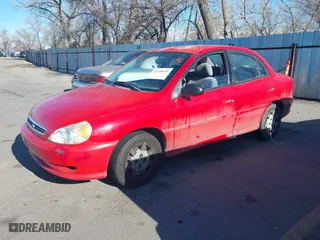 2002 Kia Rio with VIN KNADC123126182360, listed as a IAAI auction lot 41526651 with 82,052 mi miles. Bid and sale history available at carsss.com. Image 2.