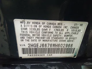 1998 Honda Civic LX with VIN 2HGEJ6676WH602966, listed as a IAAI auction lot 39722428 with 153,245 mi miles. Bid and sale history available at carsss.com. Image 9.