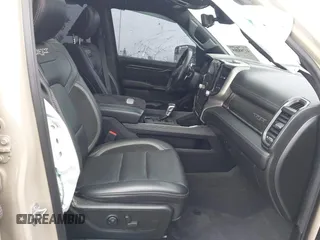2022 Ram 1500 TRX with VIN 1C6SRFU92NN383774, listed as a IAAI auction lot 41788415 with 34,646 mi miles and . Bid and sale history available at DreamBid. Image 5.