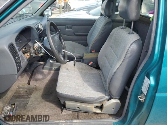 1995 Nissan Frontier XE z VIN 1N6HD16S3SC463075, wystawiony jako Copart lot #76235934 z przebiegiem 122 466 mil mil oraz Szkoda całkowita • Salvage title. Historia ofert i sprzedaży dostępna na DreamBid. Obrazek 7.