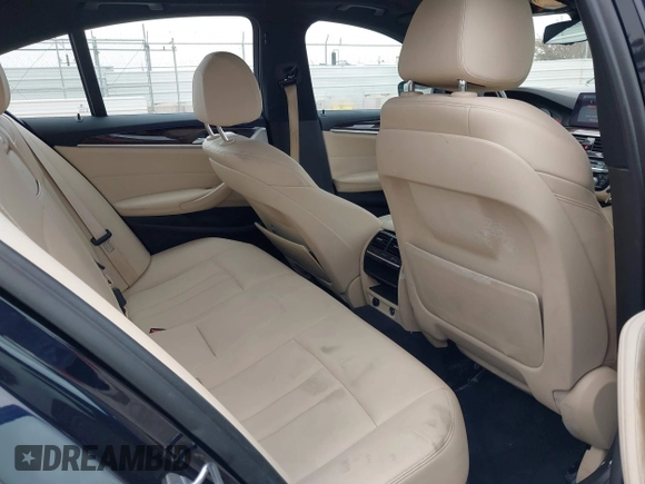 2019 BMW 5 Series 530e with VIN WBAJA9C56KB388241, listed as a IAAI auction lot 42181217 with 69,805 mi miles and . Bid and sale history available at carsss.com. Image 8.