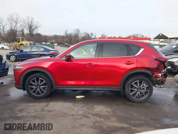 2018 Mazda CX-5 Grand Touring with VIN JM3KFBDM8J0406276, listed as a IAAI auction lot 41447355 with 70,772 mi miles. Bid and sale history available at carsss.com. Image 14.