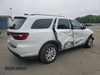 2014 Dodge Durango SXT with VIN 1C4RDJAG4EC323423, listed as a Copart auction lot 60159145 with 160,022 mi miles and Salvage title. Bid and sale history available at DreamBid. Image 3.