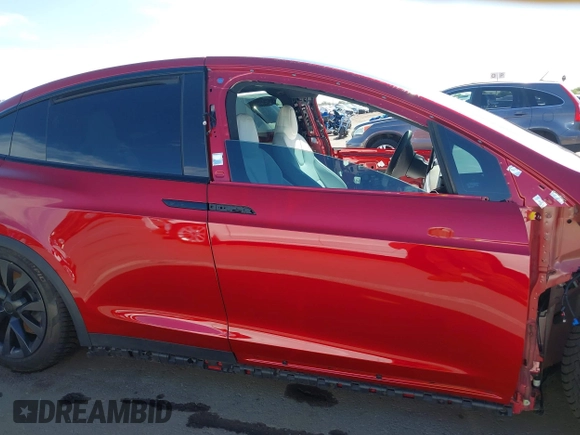 2023 Tesla Model X with VIN 7SAXCBE52PF416278, listed as a IAAI auction lot 42066747 with Not Provided miles and . Bid and sale history available at DreamBid. Image 14.