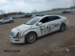 2013 Cadillac XTS Platinum z VIN 2G61V5S38D9204439, wystawiony jako Copart lot #53886495 z przebiegiem 89 940 mil mil oraz Szkody całkowita. Historia ofert i sprzedaży dostępna na DreamBid. Obrazek 1.