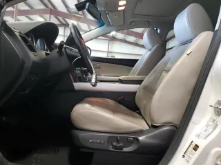 2014 Mazda CX-9 Grand Touring z VIN JM3TB3DV9E0428632, wystawiony jako Copart lot #59928885 z przebiegiem 83 697 mil mil oraz Szkoda całkowita • Salvage title. Historia ofert i sprzedaży dostępna na DreamBid. Obrazek 7.