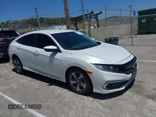 2021 Honda Civic LX z VIN 2HGFC2F6XMH506592, wystawiony jako IAAI lot #42294349 z przebiegiem 37 936 mil mil oraz . Historia ofert i sprzedaży dostępna na DreamBid. Obrazek 1.