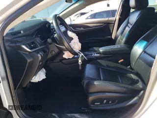 2018 Cadillac XTS with VIN 2G61L5S34J9134469, listed as a Copart auction lot 46660945 with 122,011 mi miles and Salvage Title. Bid and sale history available at carsss.com. Image 7.
