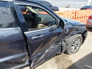 2015 Jeep Grand Cherokee Overland with VIN 1C4RJFCG6FC831641, listed as a IAAI auction lot 41877680 with 143,568 mi miles. Bid and sale history available at carsss.com. Image 6.