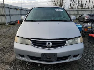 2002 Honda Odyssey EX z VIN 2HKRL18692H578746, wystawiony jako Copart lot #51281845 z przebiegiem 282 844 mil mil oraz Szkoda całkowita • Salvage title. Historia ofert i sprzedaży dostępna na DreamBid. Obrazek 5.