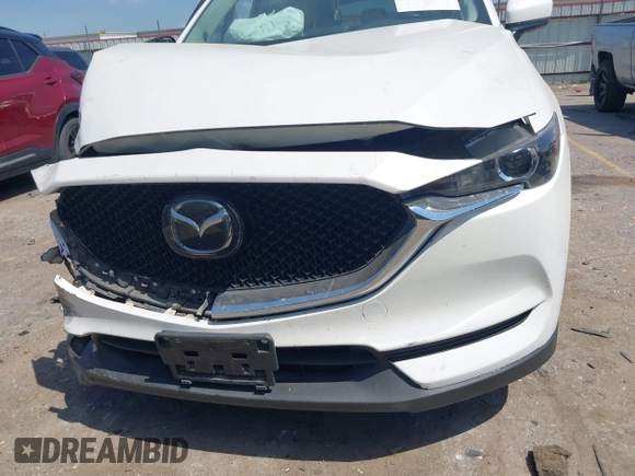 2019 Mazda CX-5 Touring with VIN JM3KFACM7K1656311, listed as a IAAI auction lot 41833187 with 83,888 mi miles. Bid and sale history available at carsss.com. Image 6.