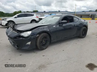 2016 Scion FR-S z VIN JF1ZNAA16G8707210, wystawiony jako Copart lot #56570115 z przebiegiem 170 227 mil mil oraz Szkoda całkowita • Salvage title. Historia ofert i sprzedaży dostępna na DreamBid. Obrazek 1.