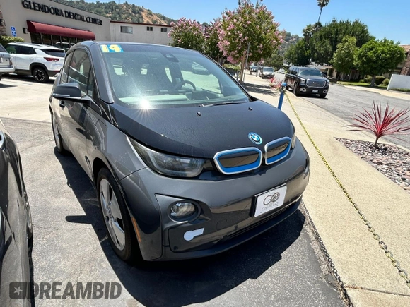2014 BMW i3 with VIN WBY1Z4C51EV274633, listed as a Copart auction lot 64677185 with 61,664 mi miles and Clean title. Bid and sale history available at DreamBid. Image 1.