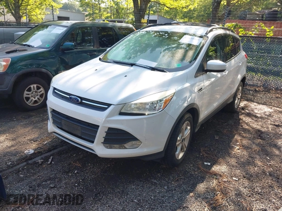 2013 Ford Escape SE with VIN 1FMCU0GX4DUC68046, listed as a IAAI auction lot 42839369 with 185,429 mi miles and . Bid and sale history available at DreamBid. Image 2.