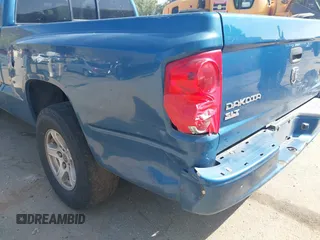 2005 Dodge Dakota SLT with VIN 1D7HE42N85S194847, listed as a IAAI auction lot 41880048 with 289,575 mi miles and . Bid and sale history available at DreamBid. Image 6.