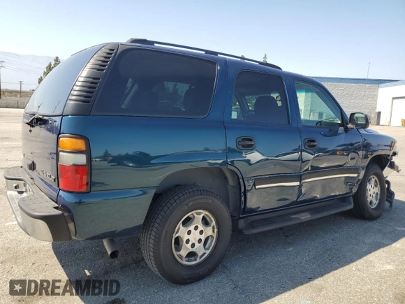 2005 Chevrolet Tahoe LS with VIN 1GNEC13V75R173583, listed as a Copart auction lot 59998015 with 164,575 mi miles and Salvage title. Bid and sale history available at DreamBid. Image 3.