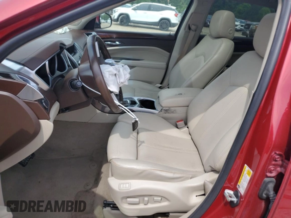 2012 Cadillac SRX Luxury Collection z VIN 3GYFNAE33CS541684, wystawiony jako Copart lot #57157985 z przebiegiem 158 068 mil mil oraz Szkoda całkowita • Salvage title. Historia ofert i sprzedaży dostępna na DreamBid. Obrazek 7.