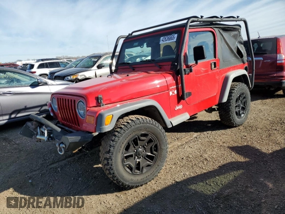 2002 Jeep Wrangler X with VIN 1J4FA39S32P771120, listed as a Copart auction lot 42636665 with 153,168 mi miles and Salvage Title. Bid and sale history available at carsss.com. Image 1.
