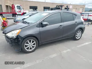 2013 Toyota Prius One with VIN JTDKDTB34D1047568, listed as a IAAI auction lot 41950373 with 99,319 mi miles and . Bid and sale history available at carsss.com. Image 18.