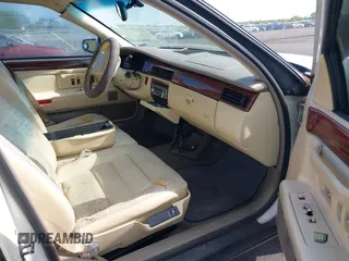 1995 Cadillac DeVille z VIN 1G6KD52BXSU278072, wystawiony jako IAAI lot #42036812 z przebiegiem 149 180 mil mil oraz . Historia ofert i sprzedaży dostępna na DreamBid. Obrazek 5.