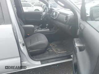 2019 Toyota Tacoma SR z VIN 3TMCZ5AN1KM206969, wystawiony jako IAAI lot #41951159 z przebiegiem 94 875 mil mil oraz . Historia ofert i sprzedaży dostępna na DreamBid. Obrazek 5.
