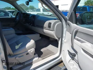 2013 Chevrolet Silverado 1500 LT with VIN 3GCPKSE71DG203443, listed as a IAAI auction lot 42033447 with 128,904 mi miles. Bid and sale history available at carsss.com. Image 5.