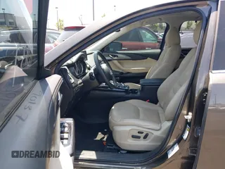 2017 Mazda CX-9 Touring with VIN JM3TCBCY1H0131233, listed as a IAAI auction lot 42490137 with 84,216 mi miles and . Bid and sale history available at DreamBid. Image 5.